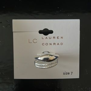Lauren Conrad 3 layered ring silver in color